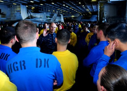 US Navy 100724-N-3570S-083 Vice Adm. Richard W. Hunt, commander of Combined Task Force Rim of the Pacific (RIMPAC) 2010, explains the RIMPAC exercise to Sailors in the hangar bay of the aircraft carrier USS Ronald Reagan (CVN 7