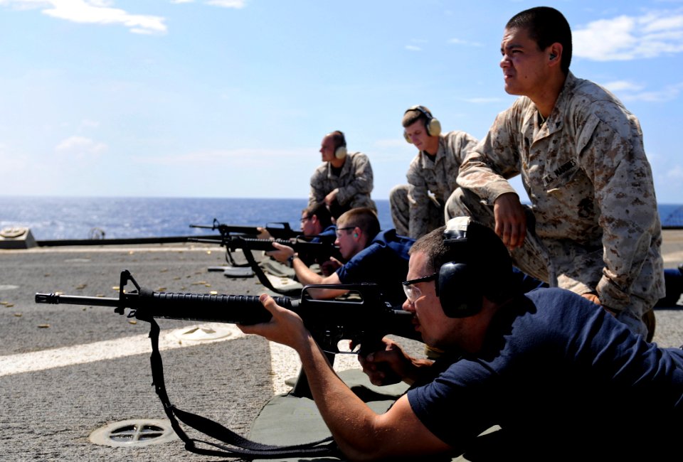 US Navy 100723-N-7280V-349 ailors fire M-16 rifles during a weapons qualification shoot aboard the U.S. 7th Fleet command ship USS Blue Ridge