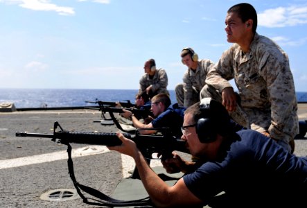US Navy 100723-N-7280V-349 ailors fire M-16 rifles during a weapons qualification shoot aboard the U.S. 7th Fleet command ship USS Blue Ridge