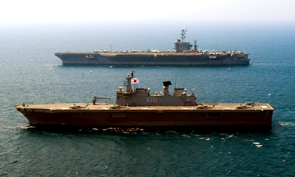 US Navy 100727-N-6720T-066 The Republic of Korea Navy amphibious landing ship ROKS Dokdo (LPH 6111) and the aircraft carrier USS George Washington (CVN 73) transit the Sea of Japan