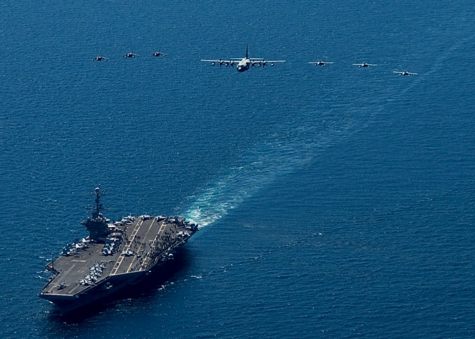 US Navy 100726-N-2013O-127 Marine Corps aircraft fly over USS George Washington (CVN 73)