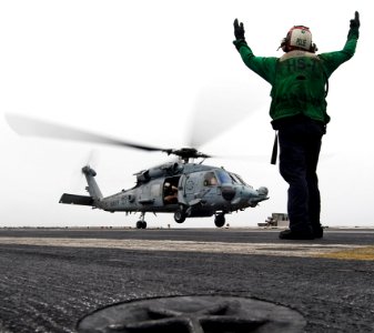 US Navy 100727-N-7317W-005 An SH-60 Sea Hawk helicopter assigned to the Dusty Dogs of Helicopter Anti-Submarine Squadron (HS) 7, lifts off from the aircraft carrier USS Harry S. Truman (CVN 75)
