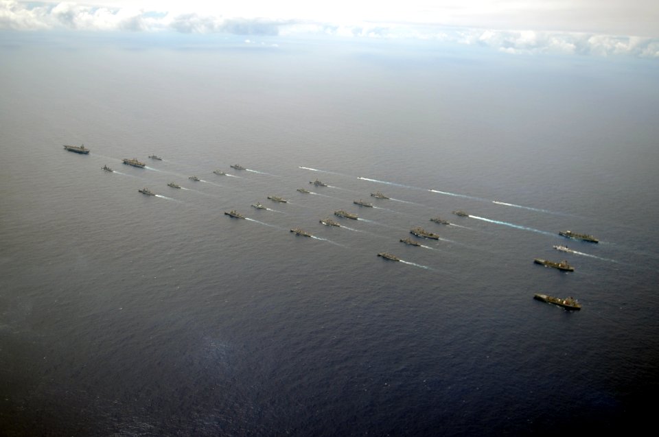 US Navy 100724-N-9500T-646 The Nimitz-class aircraft carrier USS Ronald Reagan (CVN 76) leads a mass formation of ships from Korea, Taiwan, Japan, Singapore, France, Canada, Australia and the U.S. during Rim of the Pacific (RIM