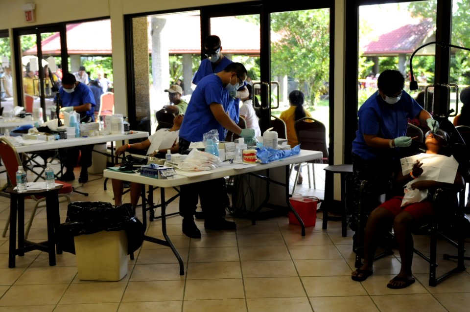 US Navy 100728-N-0864H-131 Hospital corpsmen from the U.S. 7th Fleet command ship USS Blue Ridge (LCC 19), Naval Hospital Yokosuka and Naval Hospital Guam perform dental procedures at a Pacific Partnership 2010 free dental clin