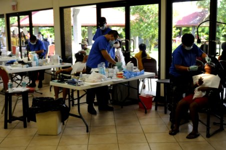 US Navy 100728-N-0864H-131 Hospital corpsmen from the U.S. 7th Fleet command ship USS Blue Ridge (LCC 19), Naval Hospital Yokosuka and Naval Hospital Guam perform dental procedures at a Pacific Partnership 2010 free dental clin