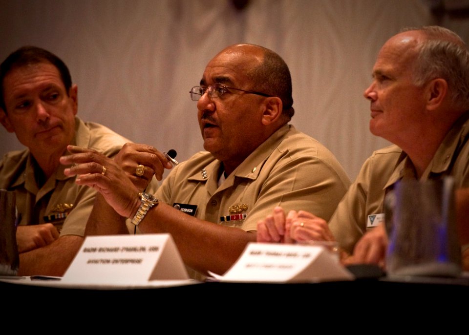 US Navy 100727-N-0807W-092 Vice Adm. Adam M. Robinson Jr., center, Surgeon General of the Navy and Chief of the Navy Bureau of Medicine and Surgery