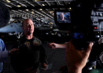 US Navy 100725-N-2013O-043 Capt. Ross Myers, commander of Carrier Air Wing (CVW) 5, speaks to embarked media during an interview aboard the aircraft carrier USS George Washington (CVN 73)