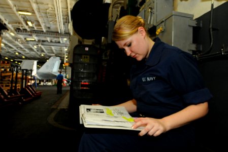 US Navy 100726-N-1092P-019 Aviation Electrician's Mate 2nd Class Christopher Phillips epairs a throttle assembly in an SH-60H Sea Hawk helicopter