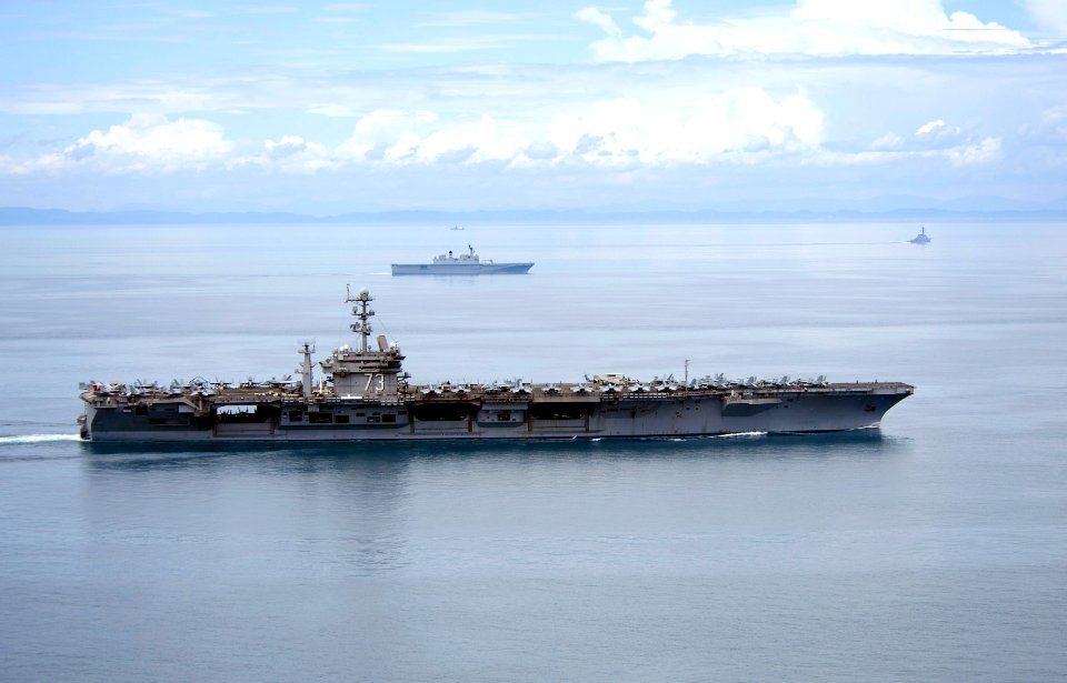 US Navy 100725-N-6720T-130 The aircraft carrier USS George Washington (CVN73) is underway with the Republic of Korea Navy amphibious landing ship Dokdo (LPH 6111) after departing Busan, Republic of Korea