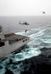 US Navy 100729-N-4135M-033 MH-60S Sea Hawk helicopters transfer supplies from USNS Sacagawea (T-AKE 2)