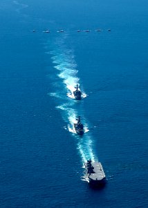 US Navy 100726-N-2013O-137 U.S. Navy and Republic of Korea ships cruise the East Sea as U.S. Air Force aircraft fly overhead in formation