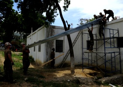 US Navy 100729-N-4153W-381 Seabees assigned to Construction Battalion Mobile Unit (CBMU) 202 and Naval Mobile Construction Battalion (NMCB) 7
