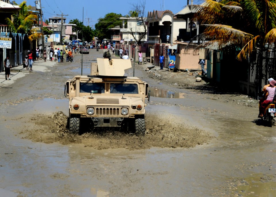 US Navy 100728-N-4153W-236 U.S. Marines embarked aboard the multi-purpose amphibious assault ship USS Iwo Jima (LHD 7), drive a Humvee