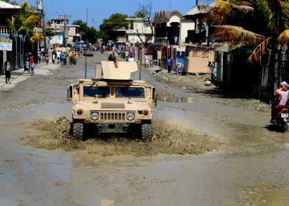 US Navy 100728-N-4153W-236 U.S. Marines embarked aboard the multi-purpose amphibious assault ship USS Iwo Jima (LHD 7), drive a Humvee