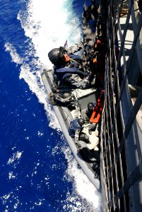 US Navy 100728-N-7058E-292 Sailors board USS Freedom (LCS 1) to participate in a joint maritime security exercise