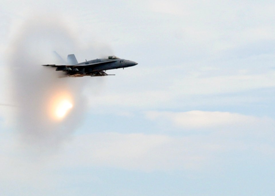 US Navy 100729-N-6935K-008 An F-A-18C Hornet assigned to the Rampagers of Strike Fighter Squadron (VFA) 83 drops flares