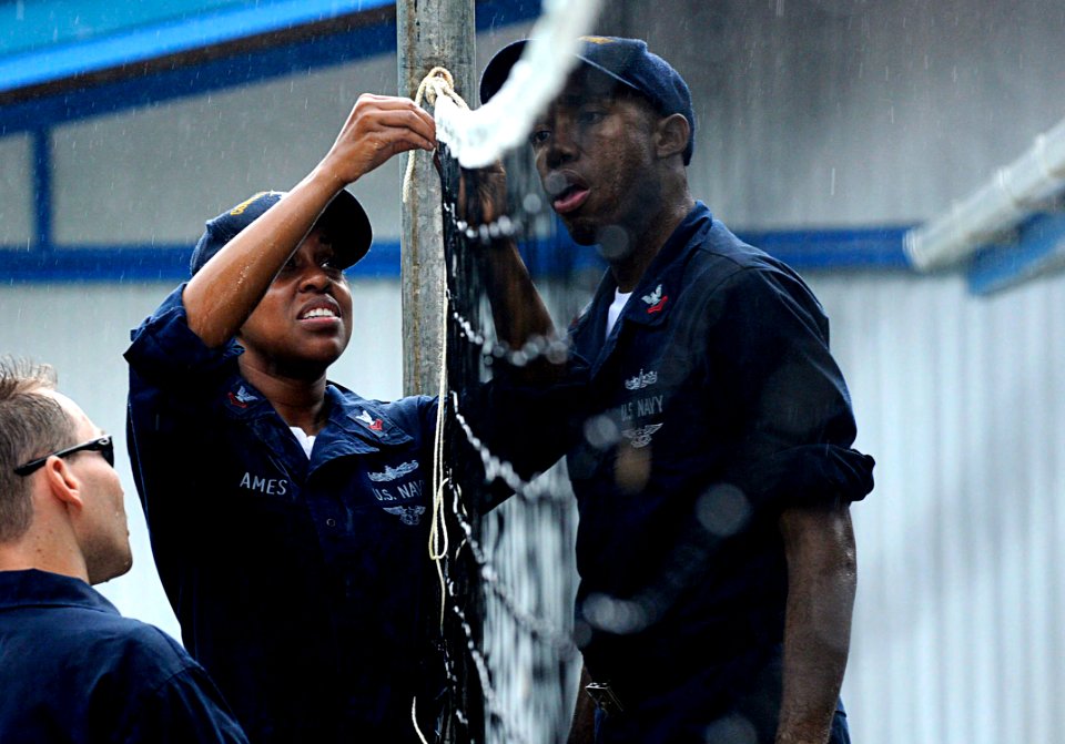 US Navy 100729-N-7478G-343 Mass Communication Specialists 2nd Classes Latrice Ames and Kenneth Hendrix assigned to the U.S. 7th Fleet staff, embarked on the U.S. 7th Fleet command ship USS Blue Ridge (LCC 19)