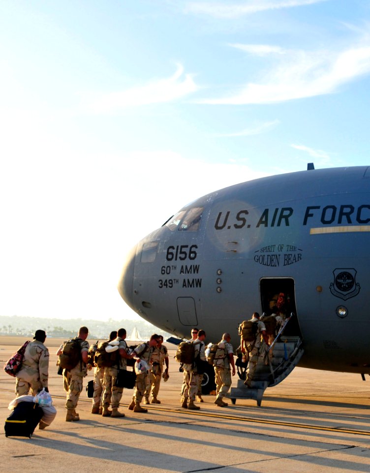 US Navy 100801-N-8878B-106 Sailors board a U.S. Air Force C-17 transport aircraft headed for a Djibouti, Africa
