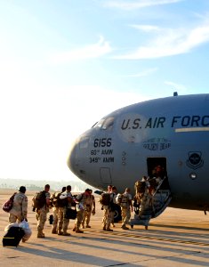 US Navy 100801-N-8878B-106 Sailors board a U.S. Air Force C-17 transport aircraft headed for a Djibouti, Africa