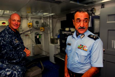 US Navy 100802-N-9706M-123 Capt. Christopher Bolt gives a tour of the ship's dental facility to Maj. Gen. Mohamed Al-Sabah