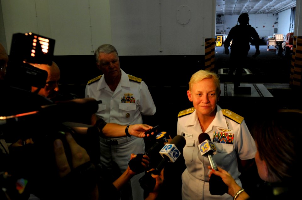 US Navy 100729-N-8273J-386 Rear Adm. Nora Tyson speaks with media after assuming command of Carrier Strike Group (CSG) 2, as Chief of Naval Operations (CNO) Adm. Gary Roughead stands by