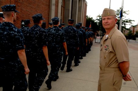 US Navy 100729-N-9818V-349 Master Chief Petty Officer of the Navy (MCPON) Rick West watches as students from the Naval Submarine School march to attend an all-hands call at Naval Submarine Base New London photo