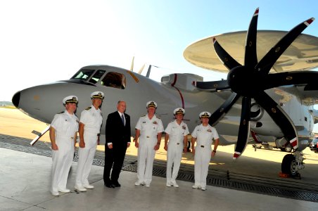 US Navy 100729-N-8273J-093 Chief of Naval Operations (CNO) Adm. Gary Roughead poses for a group photo after the Navy accepts the newest airborne early warning and control aircraft, the E-2D Advanced Hawkeye