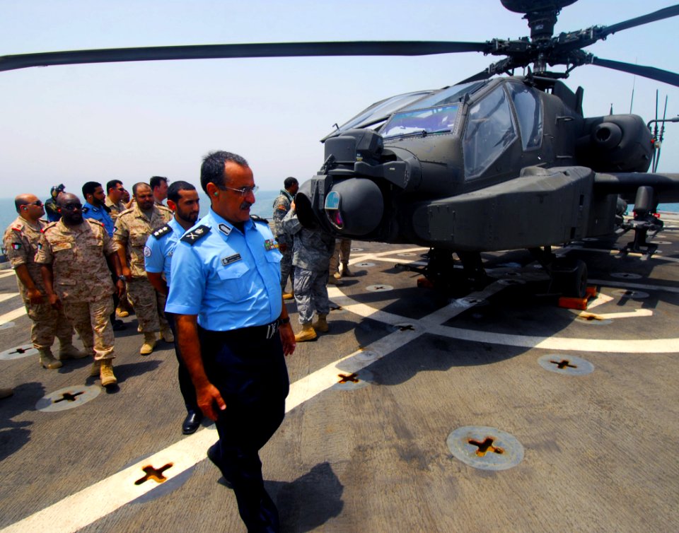US Navy 100802-N-9706M-209 Maj. Gen. Mohamed Al-Sabah and other Kuwaiti military officials inspect a Kuwaiti Army AH-64D Apache helicopter on the flight deck of USS Dubuque (LPD 8)