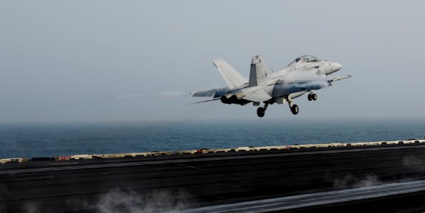 US Navy 100803-N-6362C-324 An F-A-18F Super Hornet, assigned to the Swordsmen of Strike Fighter Squadron (VFA) 32, launches from the aircraft carrier USS Harry S. Truman (CVN 75)
