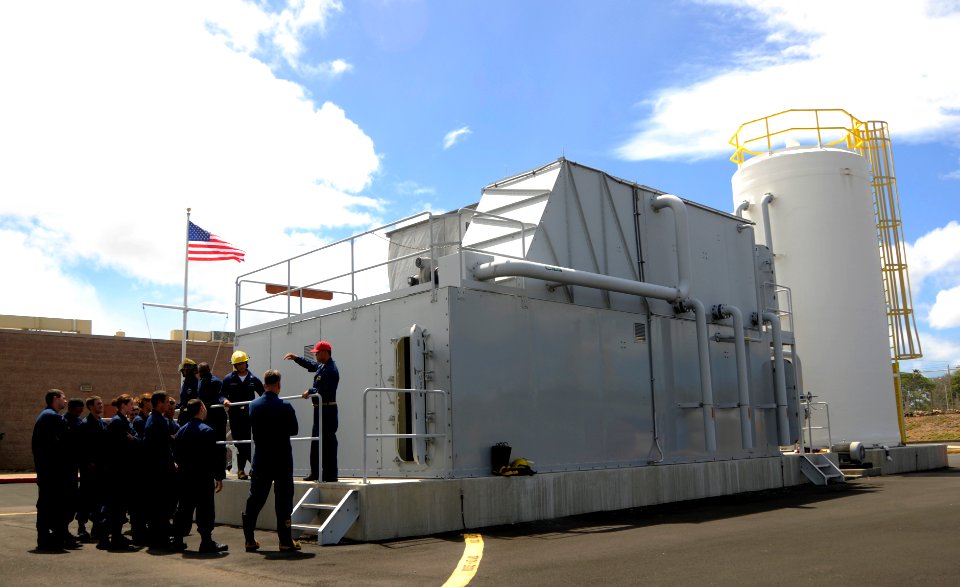 US Navy 100803-N-7498L-160 Coast Guardsmen enter the Surface Damage Control Trainer at the Center of Naval Engineering Learning Site Pearl Harbor