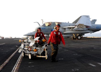 US Navy 100801-N-1092P-328 Marines transport ordnance across the flight deck to the bomb farm aboard USS Harry S. Truman (CVN 75)