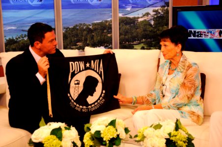 US Navy 100805-N-7498L-025 Carole Hickerson appears on the Navy News segment of KHON2 TV with anchor Jai Cunningham