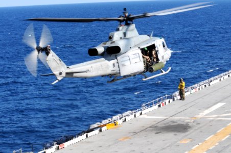 US Navy 100802-N-3852A-330 A UH-1Y Huey helicopter takes off from the amphibious assault ship USS Wasp (LHD 1)