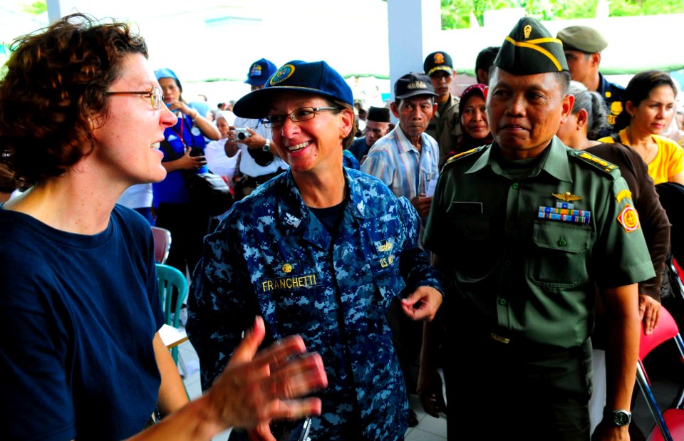 US Navy 100801-N-6410J-408 Capt. Lisa M. Franchetti, speaks to site officer-in-charge, Lt. Cmdr. (Dr.) Sandy Kimmer, at a medical civic action program in Ambon, Indonesia