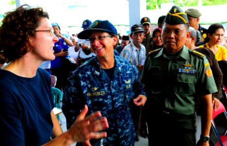 US Navy 100801-N-6410J-408 Capt. Lisa M. Franchetti, speaks to site officer-in-charge, Lt. Cmdr. (Dr.) Sandy Kimmer, at a medical civic action program in Ambon, Indonesia photo