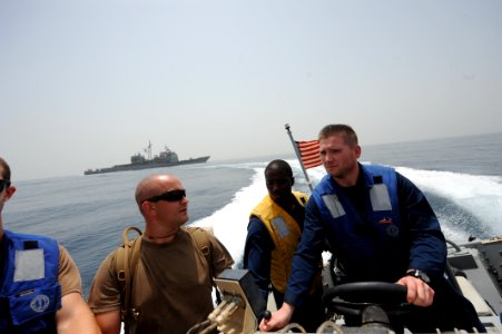 US Navy 100806-N-6463B-093 Sailors assigned to the ship's visit, board, search and seizure team and Coast Guardsmen assigned to Law Enforcement Detachment 404