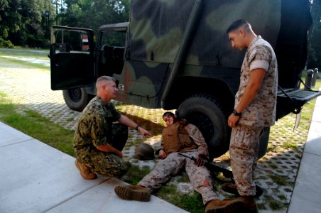 US Navy 100804-N-9818V-089 Sailors assigned to Field Medical Training Battalion-East show Master Chief Petty Officer of the Navy (MCPON) Rick West some of the simulation training during his visit to Marine Corps Base, Camp Leje