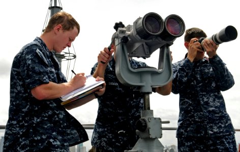 US Navy 100807-N-1675O-158 Sailors photograph passing ships