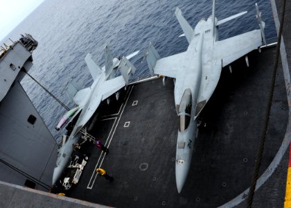 US Navy 100807-N-2821G-009 wo F-A-18 Super Hornets are raised on an elevator to the flight deck aboard the aircraft carrier USS Abraham Lincoln (CVN 72)