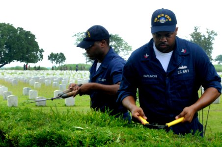 US Navy 100805-N-7478G-418 Operations Specialist Seaman Chazz Brown, left, and Operations Specialist 2nd Class Reginald Harlmon, assigned to the U.S. 7th Fleet command ship USS Blue Ridge (LCC 19),