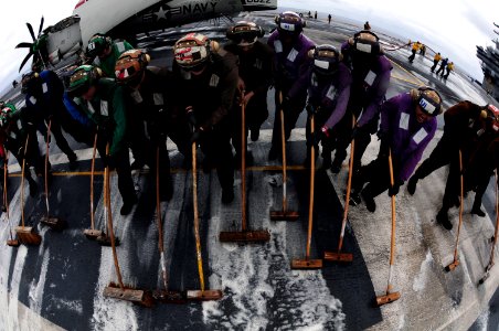 US Navy 100807-N-3659B-171 Sailors and Marines assigned to USS Ronald Reagan (CVN 76) and Carrier Air Wing (CVW) 14 participate in a scrubbing exercise