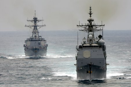 US Navy 100804-N-5016P-002 The guided-missile cruiser USS Cape St. George (CG 71) and the guided-missile destroyer USS Sterett (DDG 104) are underway during a composite training unit exercise photo