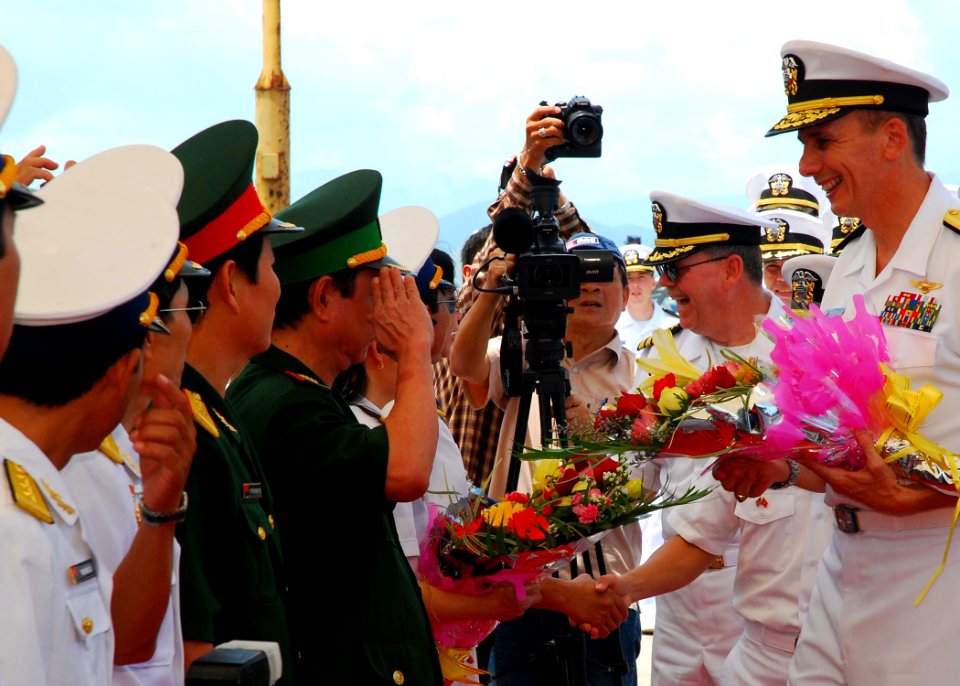 US Navy 100809-N-3589B-222 Rear Adm. Ron Horton greets senior officers of the Vietnam People's Navy and Vietnam Border Police following the arrival of USS John S. McCain (DDG 56) in Da Nang, Vietnam