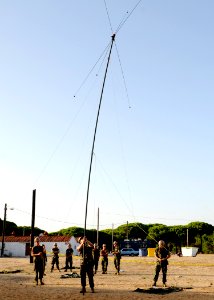 US Navy 100807-N-6357K-003 Seabees assigned to Naval Mobile Construction Battalion (NMCB) 7 erect an OE-254 antenna during a training exercise at Camp Mitchell, Naval Station in Rota, Spain