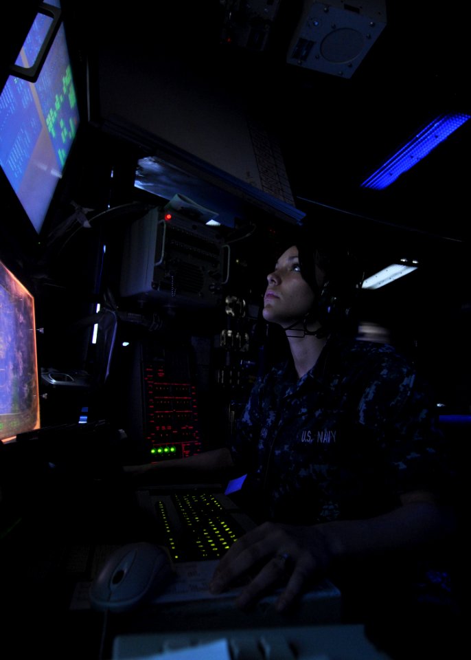 US Navy 100805-N-2013O-025 Operations Specialist Seaman Jennifer Sullivan mans a tactical link console in the combat direction center aboard USS George Washington (CVN 73)