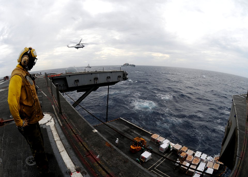 US Navy 100809-N-4830B-062 Aviation Boatswain's Mate (Handling) 3rd Class Michael Patrick, from St. Louis, monitors an aircraft elevator aboard the aircraft carrier USS George Washington (CVN 73)