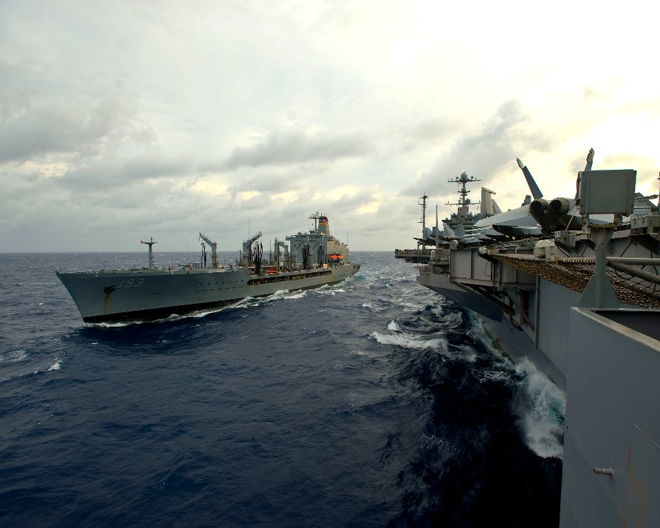 US Navy 100809-N-6720T-004 The Military Sealift Command fleet replenishment oiler USNS Walter S. Diehl (T-AO 193) transits alongside the aircraft carrier USS George Washington (CVN 73) for a replenishment at sea