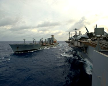US Navy 100809-N-6720T-004 The Military Sealift Command fleet replenishment oiler USNS Walter S. Diehl (T-AO 193) transits alongside the aircraft carrier USS George Washington (CVN 73) for a replenishment at sea