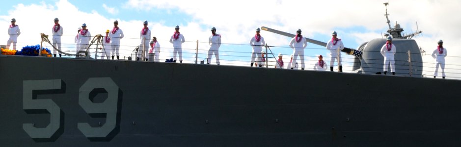 US Navy 100806-N-3666S-020 Sailors man the rails aboard the guided-missile destroyer USS Russell (DDG 59) as the ship returns to Joint Base Pearl Harbor-Hickam