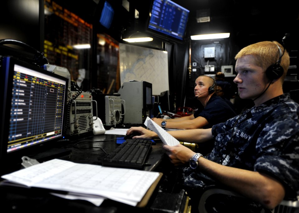 US Navy 100808-N-5838W-030 Air Traffic Controller Airman Apprentice Daniel T. Haupt, left, and Air Traffic Controller Airman Tyler S. Sip